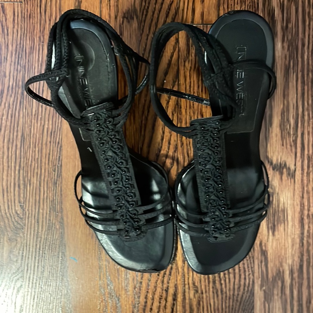 Nine West black heels with ankle strap. Size 7.5 fabric upper.